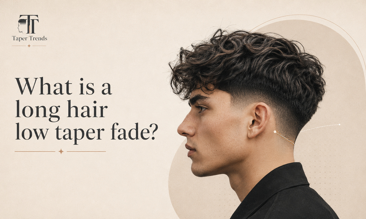 A long hair low taper fade, showing length kept on top while the sides blend low near the ears and neckline.